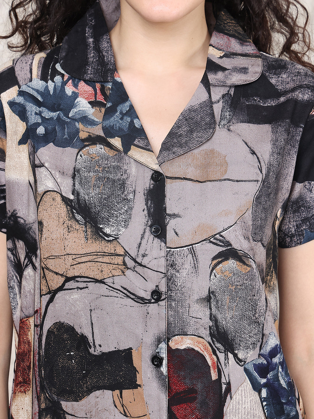 Lifestyle shot of geometric print short night suit for women
