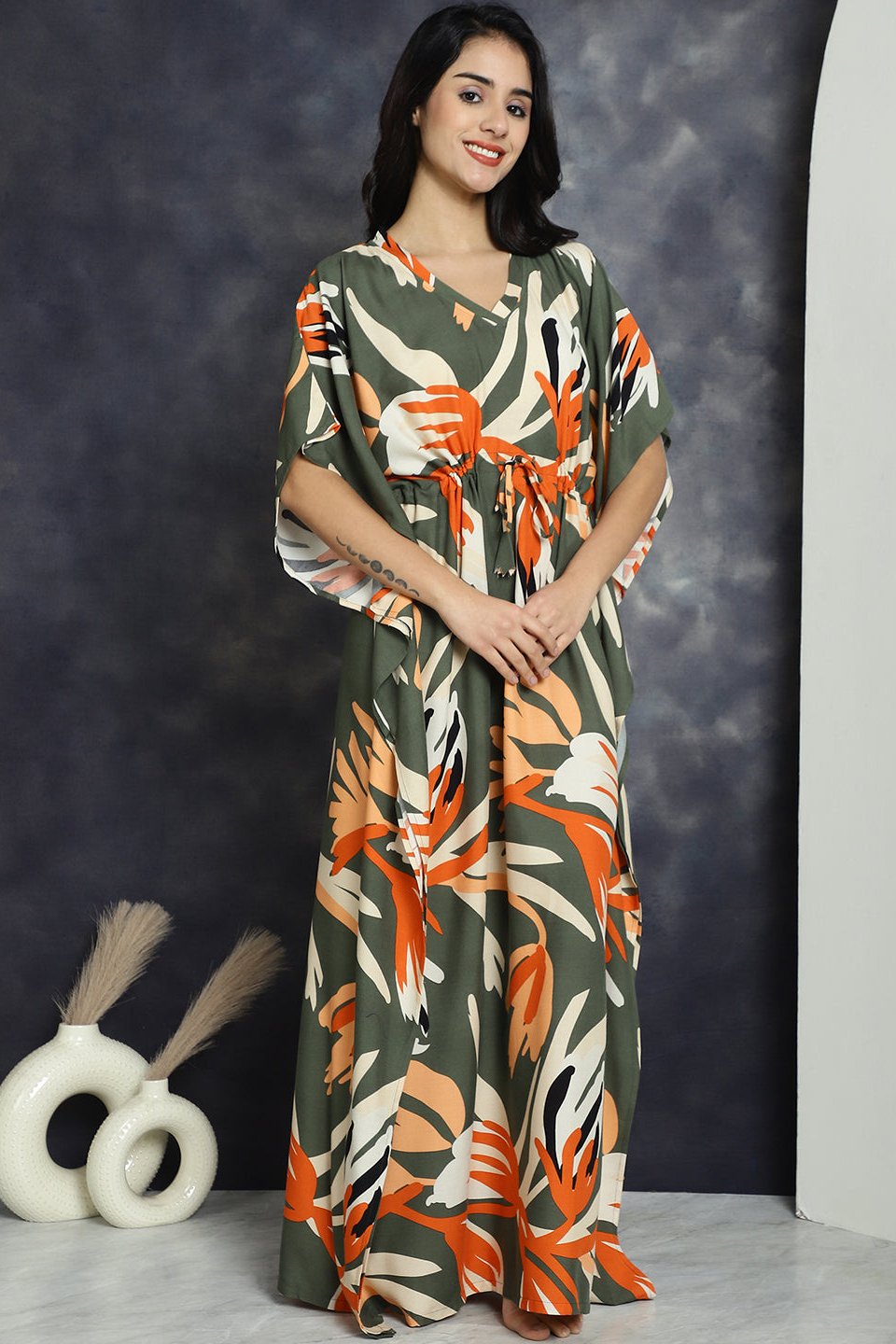 Close-up of viscose rayon detail on green Kaftan Dress