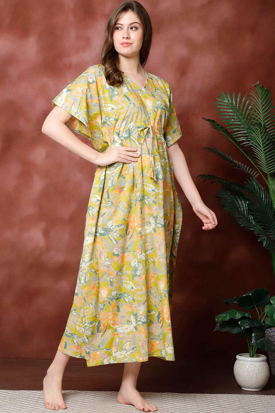 Close-up of cotton fabric detail on green Kaftan Dress