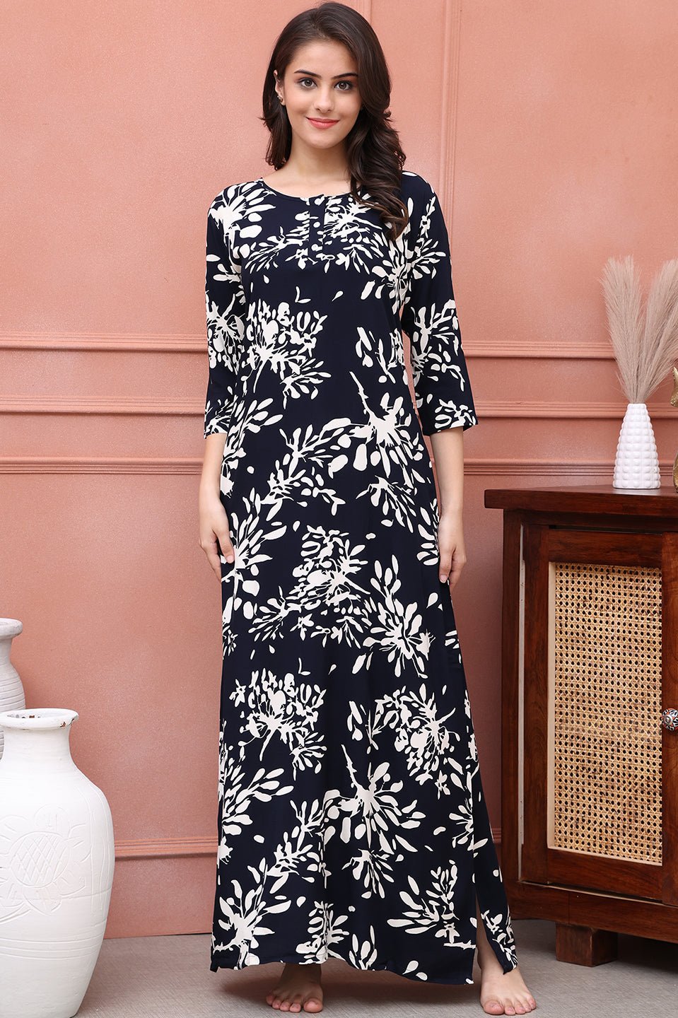 Woman wearing navy floral printed Kaftan Dress
