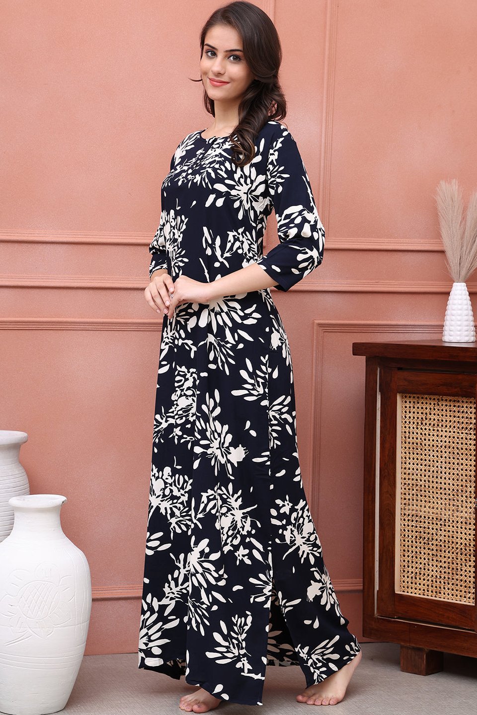 Woman wearing navy floral printed Kaftan Dress