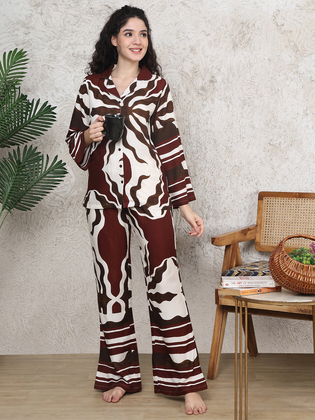 Woman wearing brown abstract print night suit