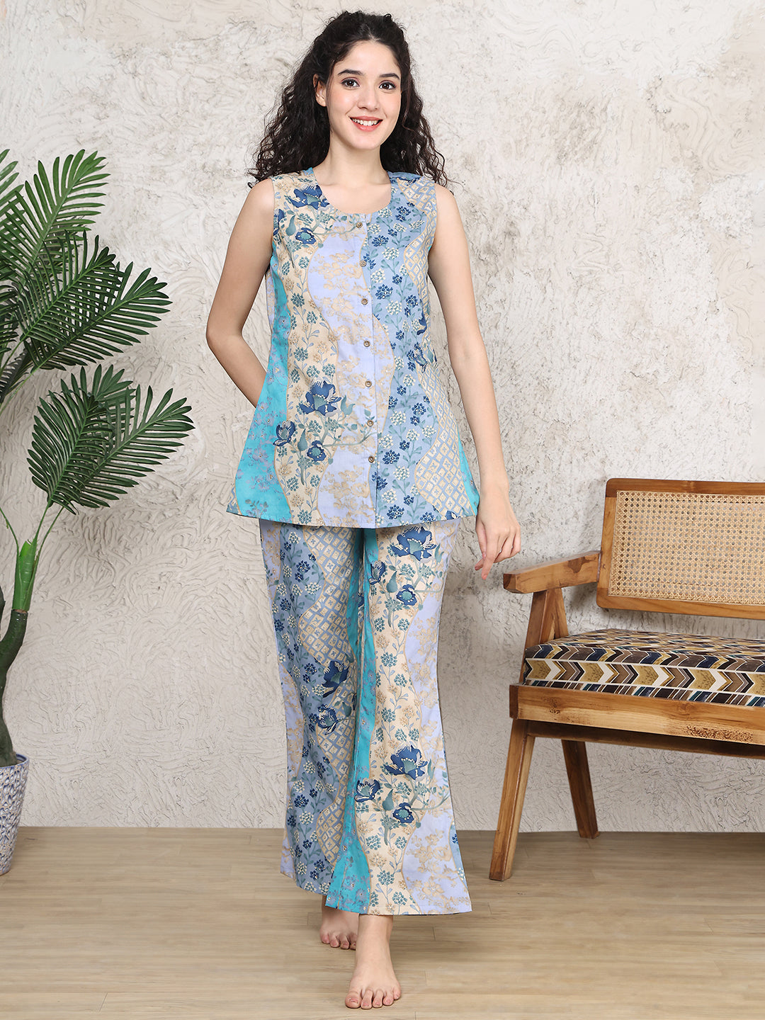 Woman wearing a blue floral print night suit