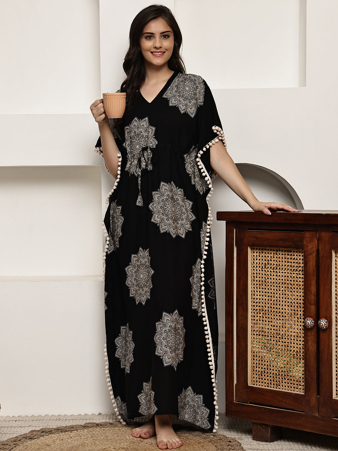 Close-up of viscose rayon fabric on black Kaftan Dress