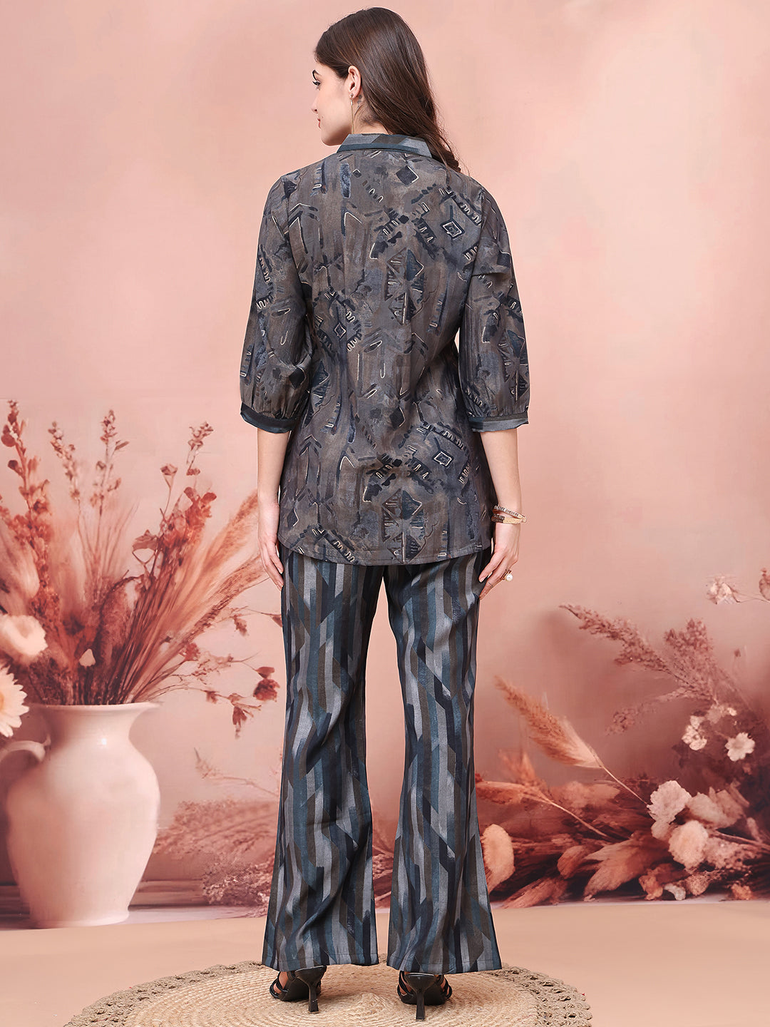 Back view of model styling Grey abstract co-ord outfit