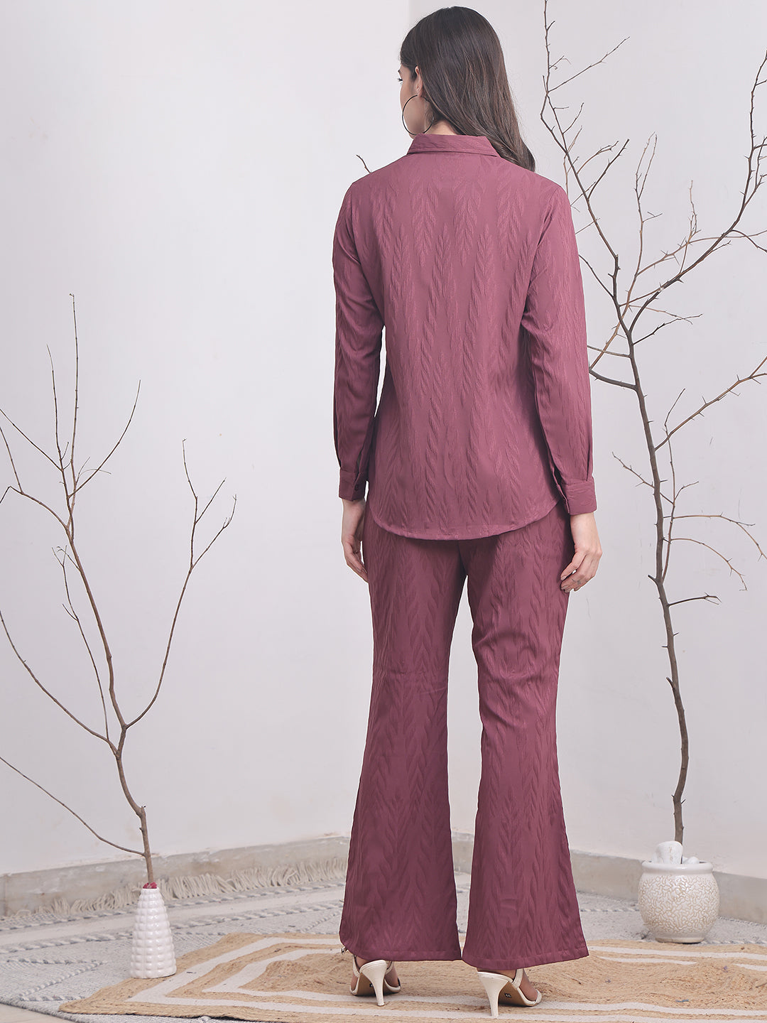 Back view of model styling Purple co-ord outfit