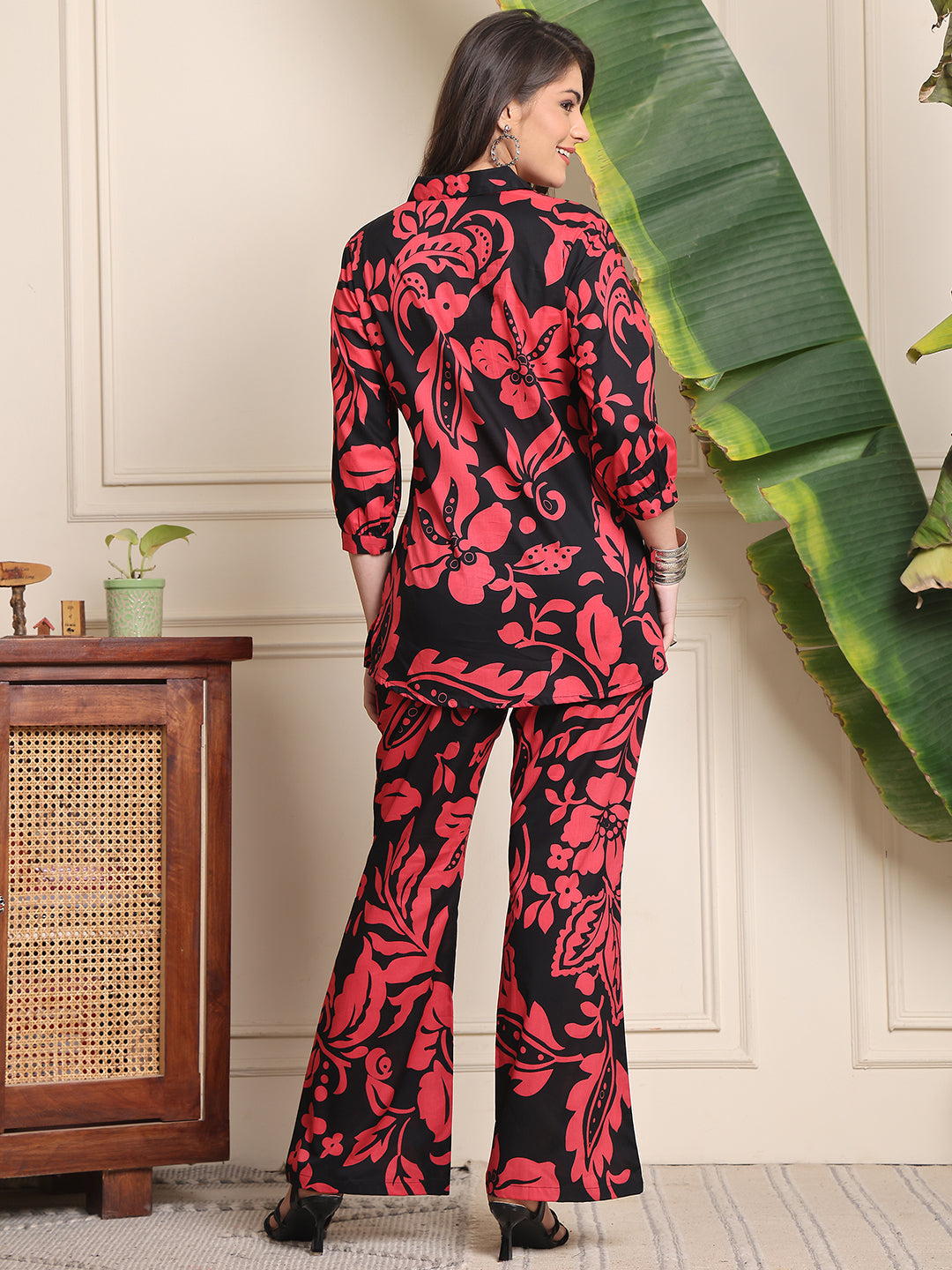 Back view of model styling black abstract cotton co-ord outfit

