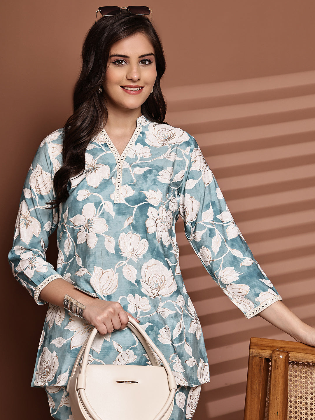 Close-up of Chanderi fabric floral print on blue co-ord