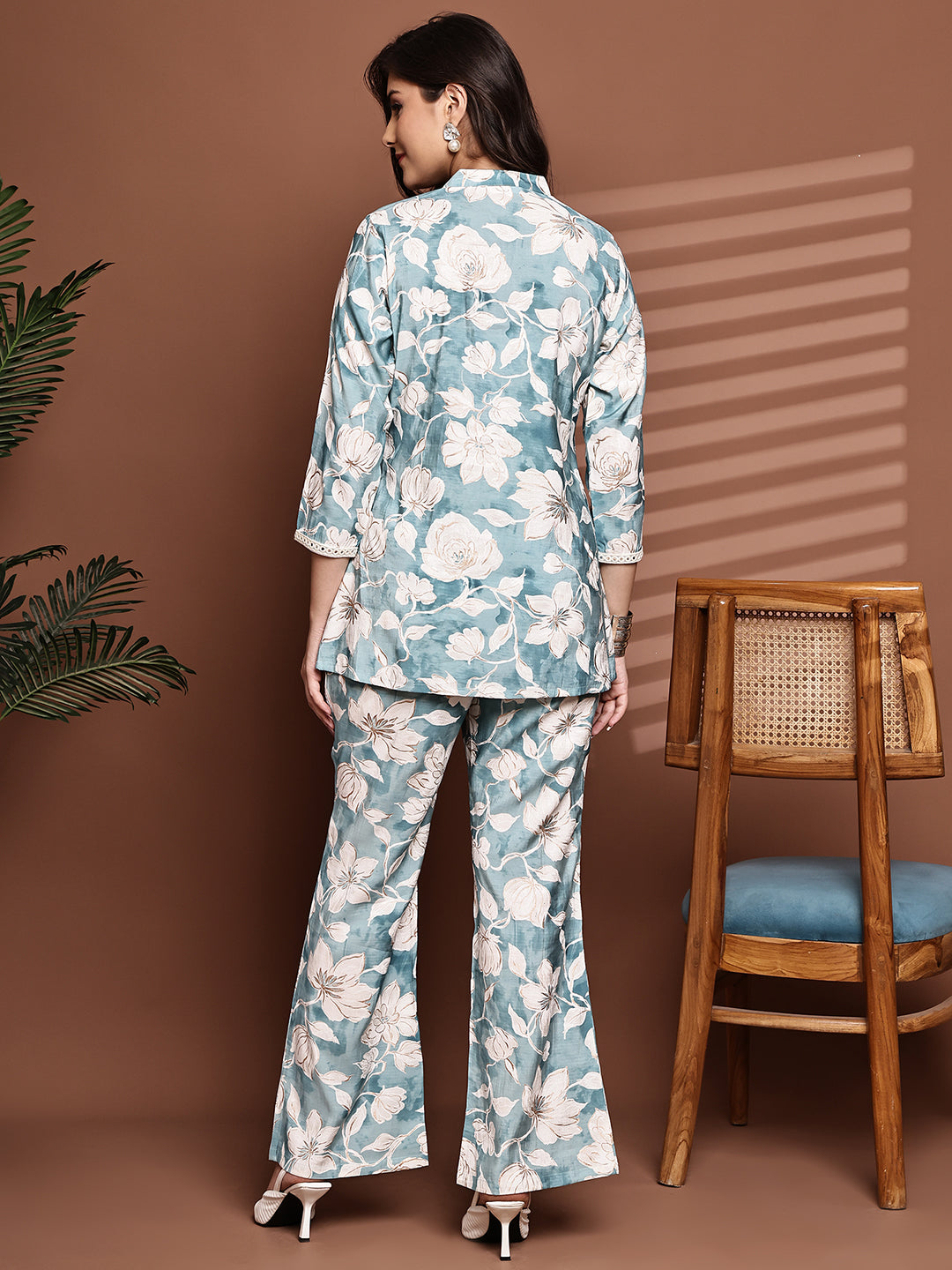 Back view of model styling blue floral co-ord outfit