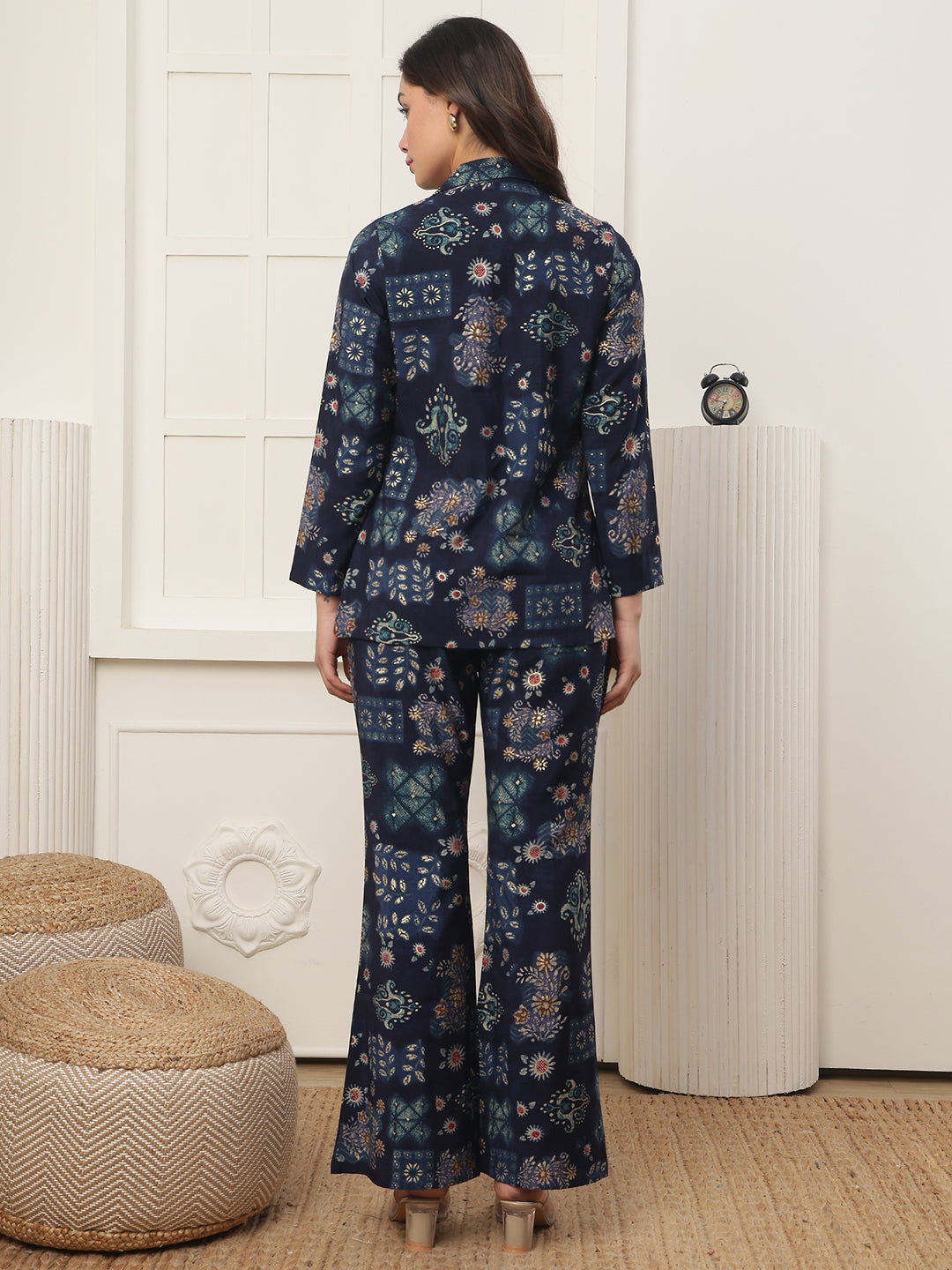 Back view of model styling Navy Blue co-ord outfit with jacket