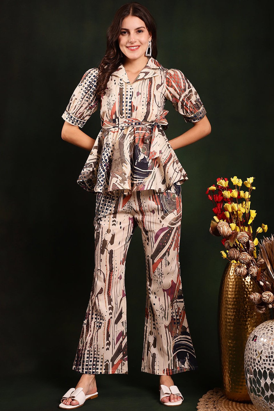 Woman wearing a cream printed co-ord set 
