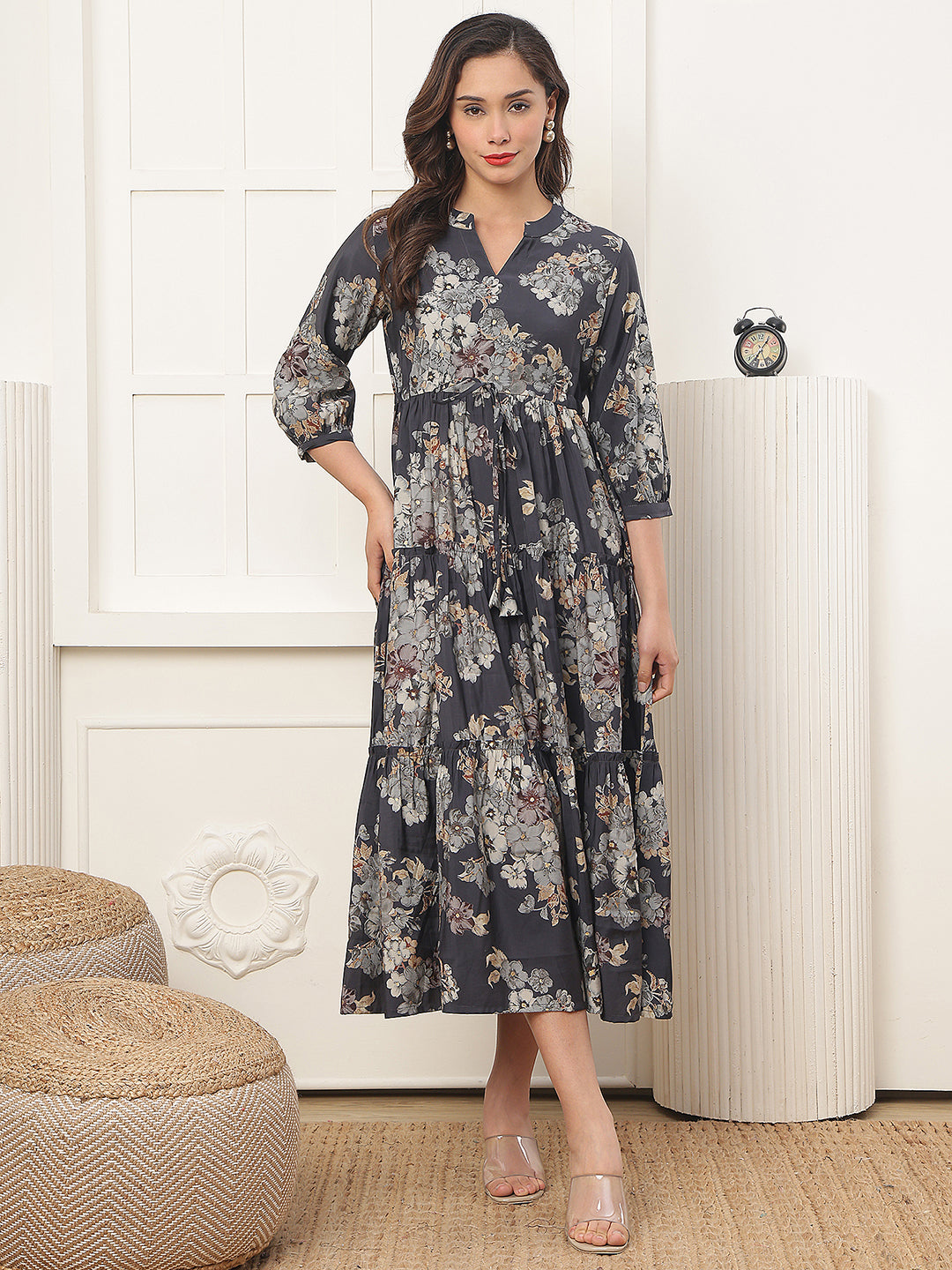 Woman wearing grey floral dress