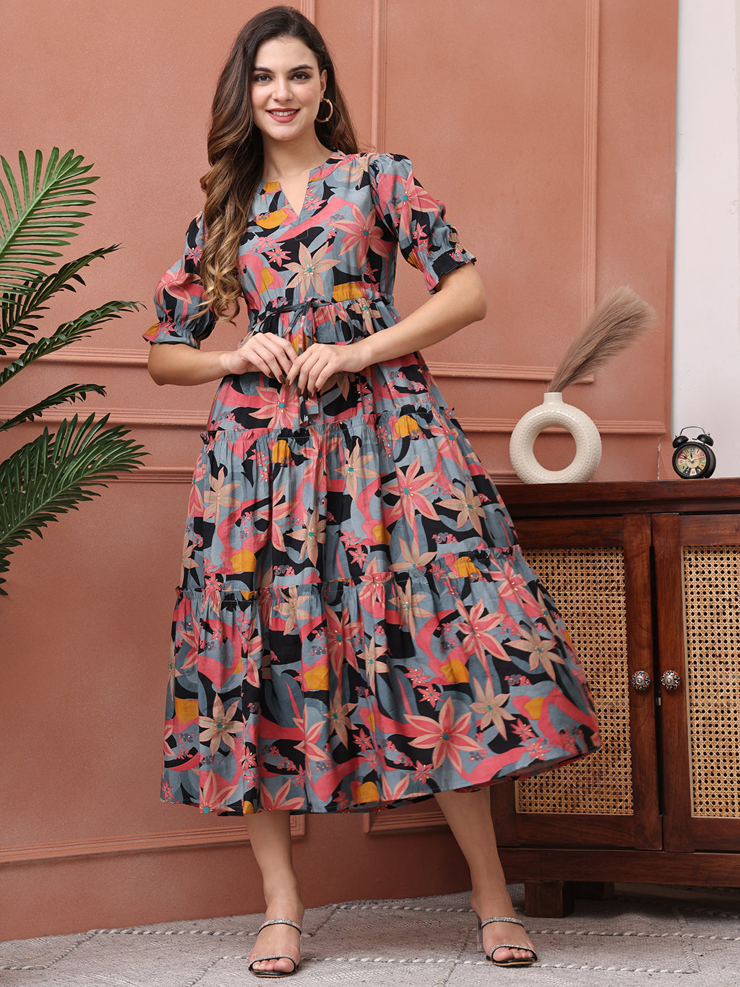 Woman wearing black floral printed Chanderi dress