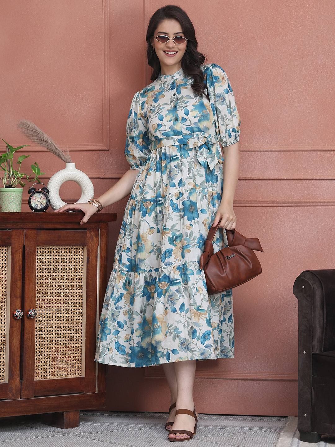 Woman wearing blue floral printed cotton dress