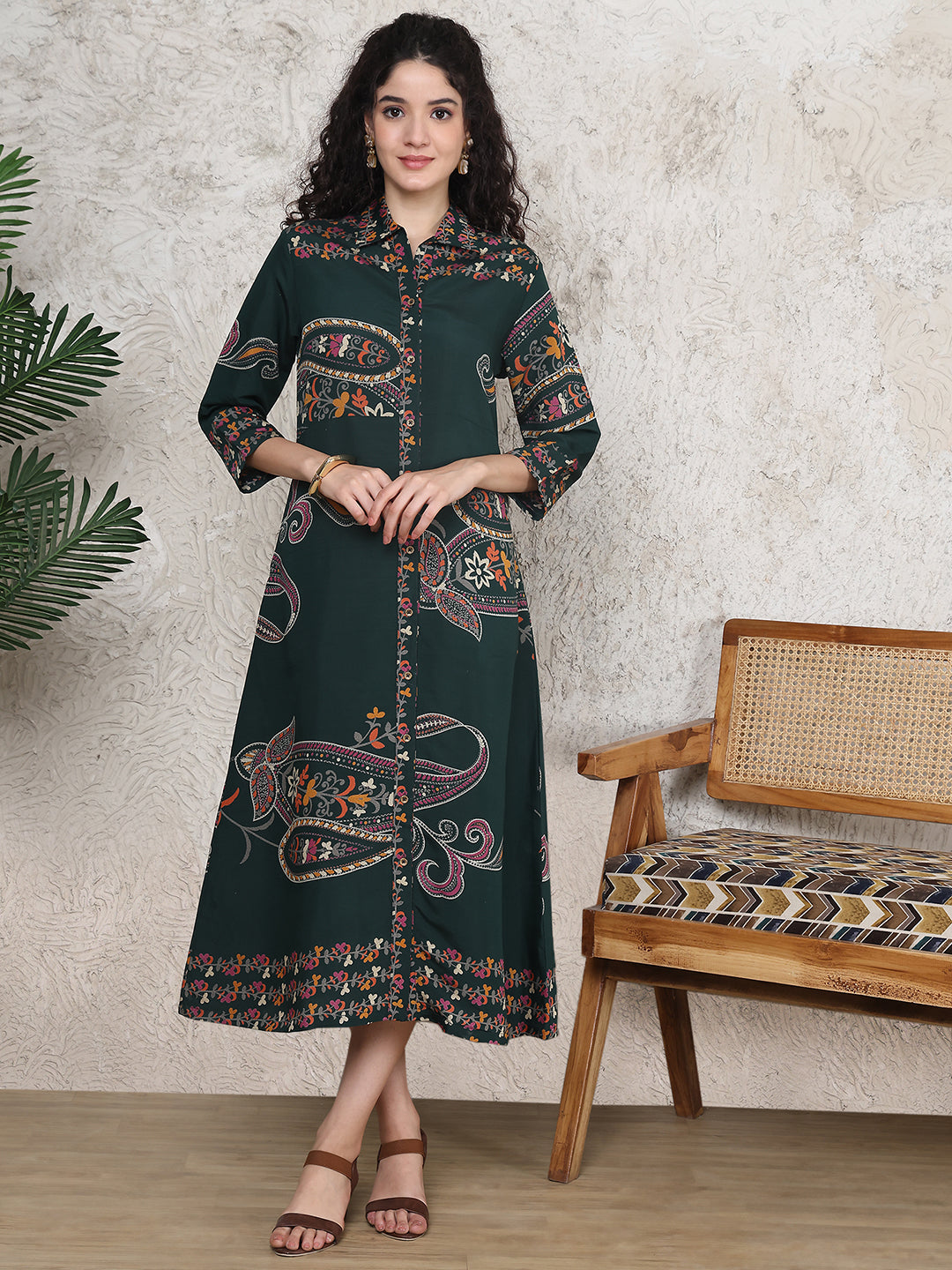 Woman wearing green floral printed dress 