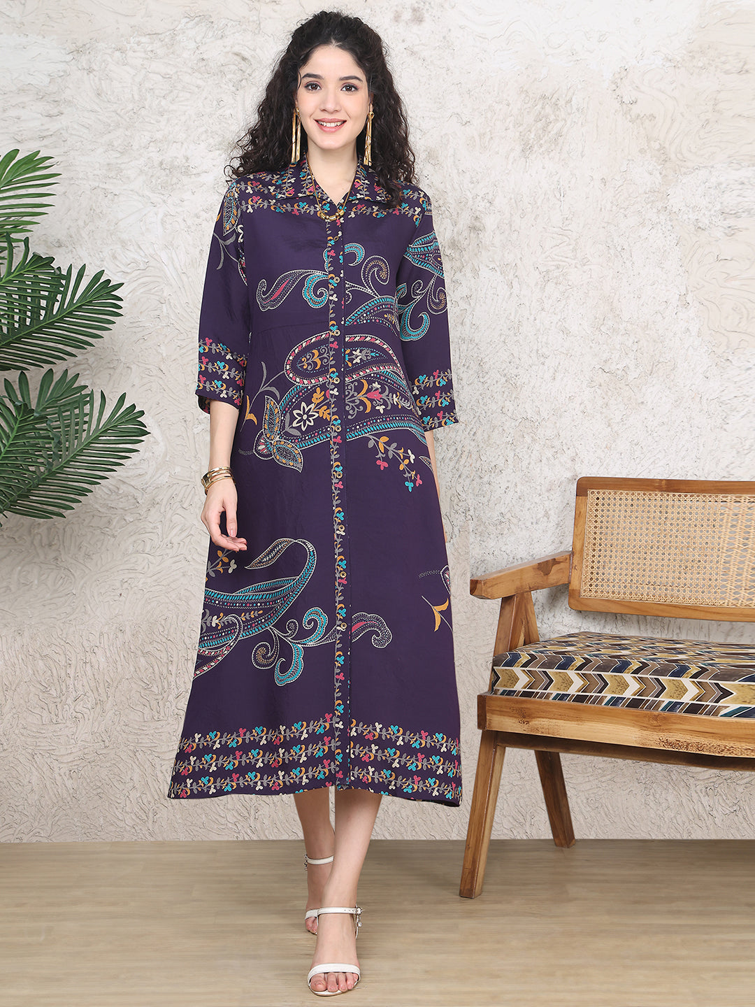 Woman wearing purple floral cotton dress