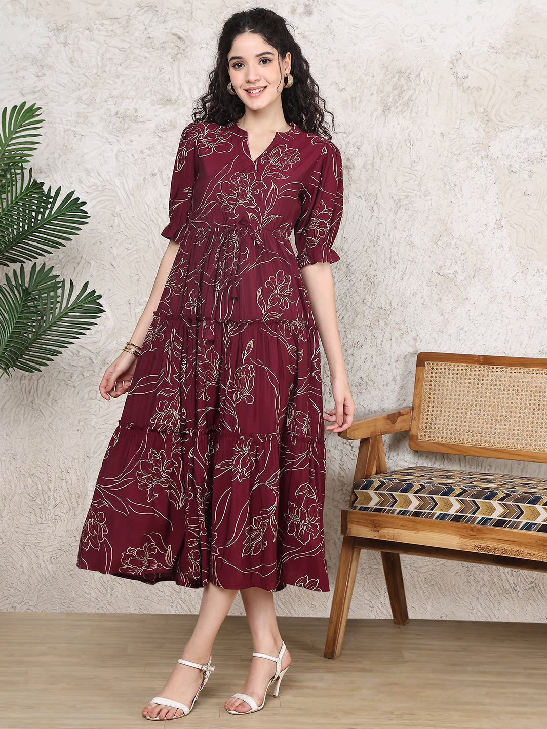 Woman wearing wine floral printed Chanderi dress