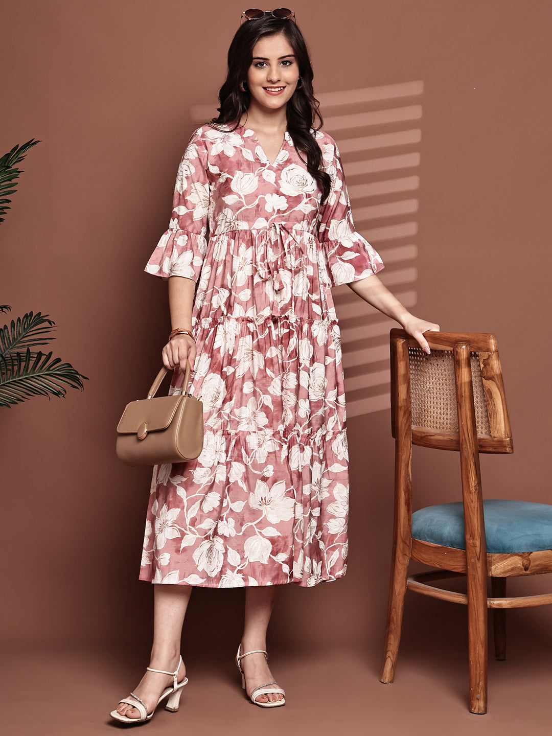 Woman wearing pink floral printed dress