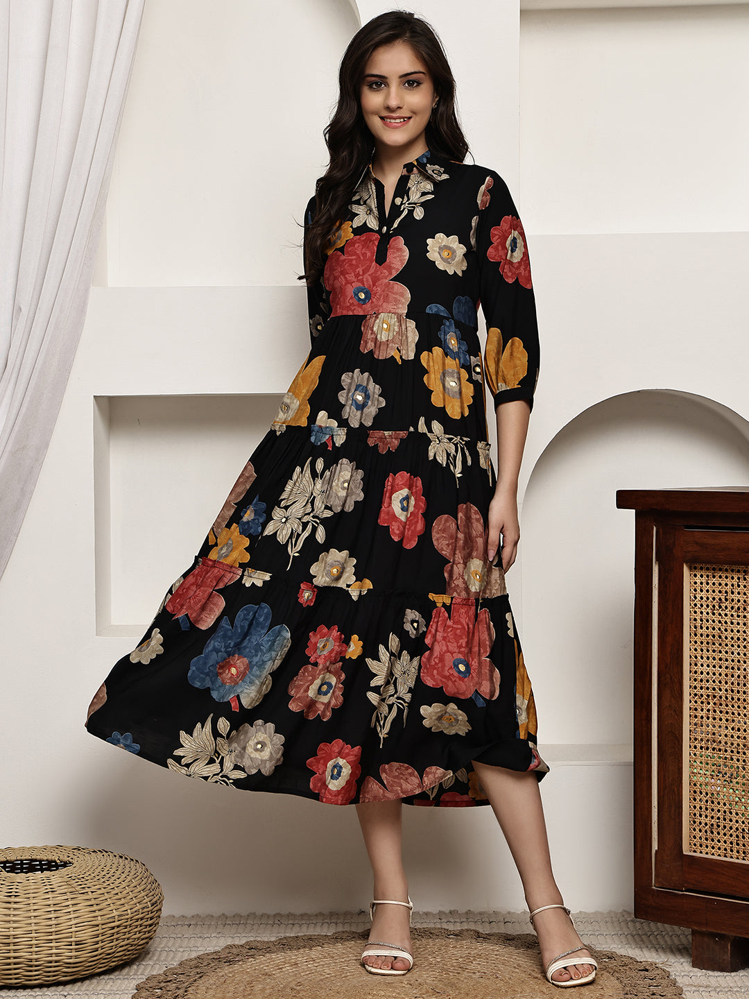 Close-up of Chanderi fabric on black floral dresses for women