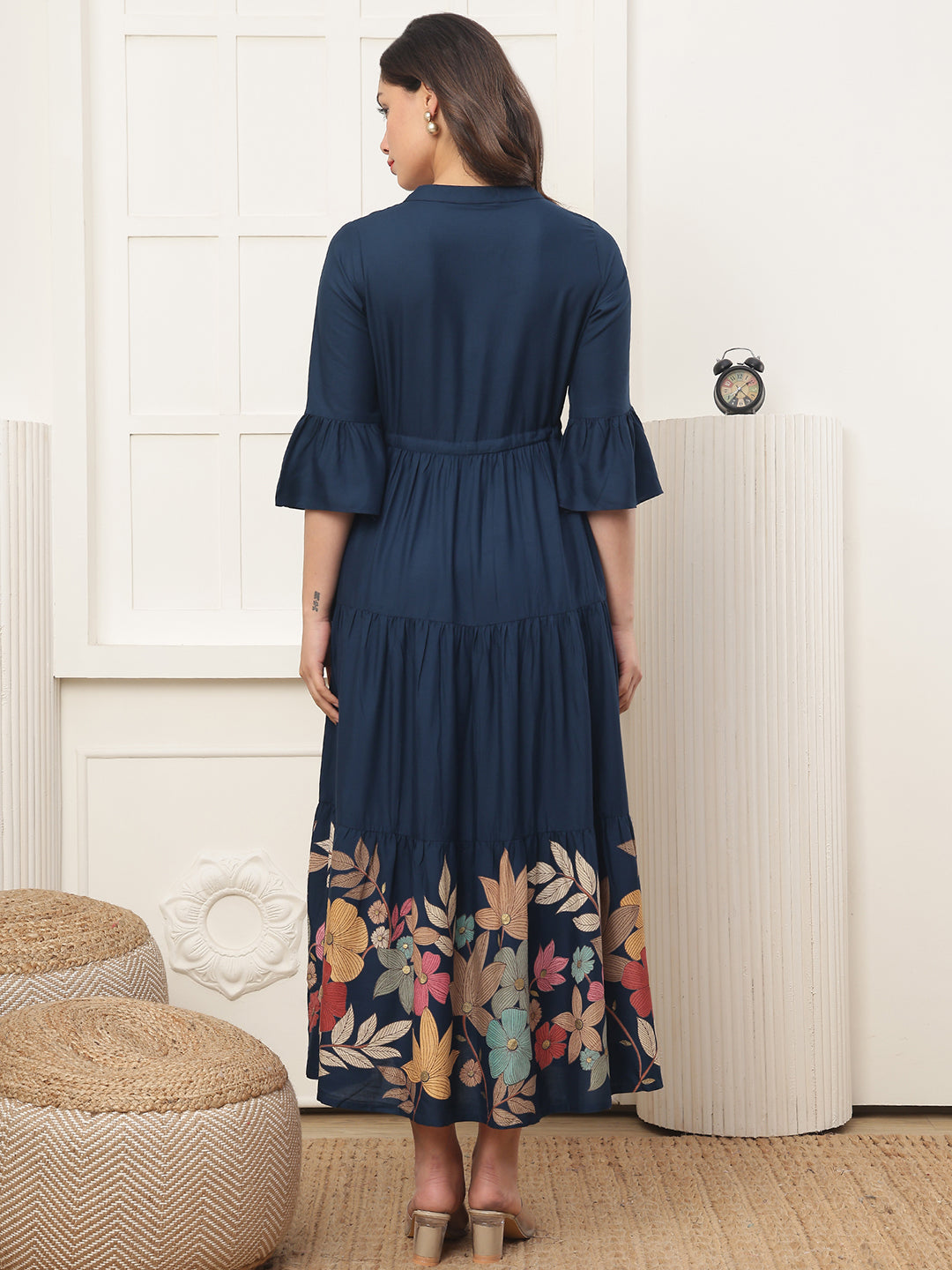 Back view of model in Blue Printed Dresses