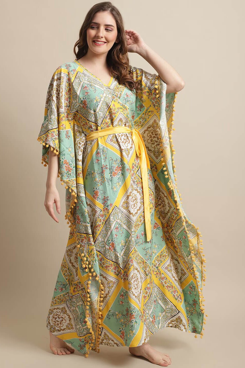 Close-up of rayon fabric detail on yellow Kaftan Dress