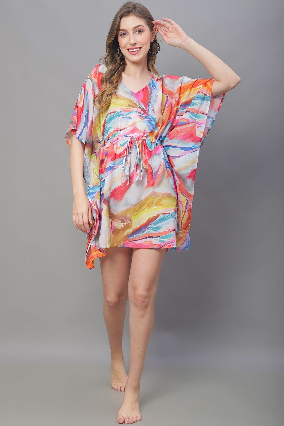 Woman wearing multi-color printed beach dress for women
