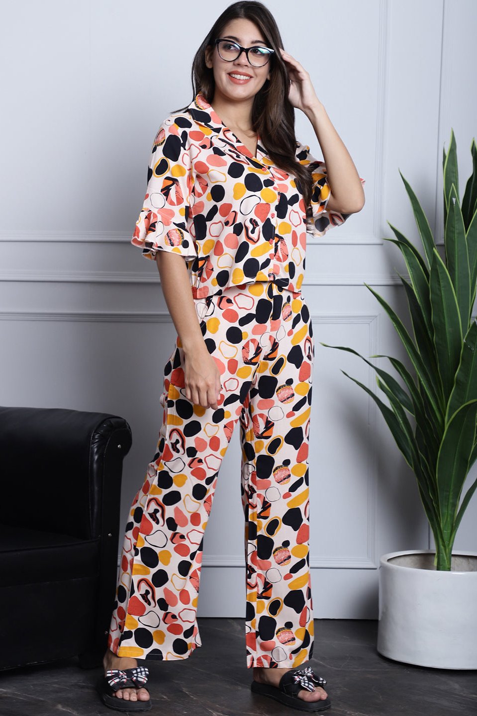 Woman wearing Peach Printed Rayon Night Suit
