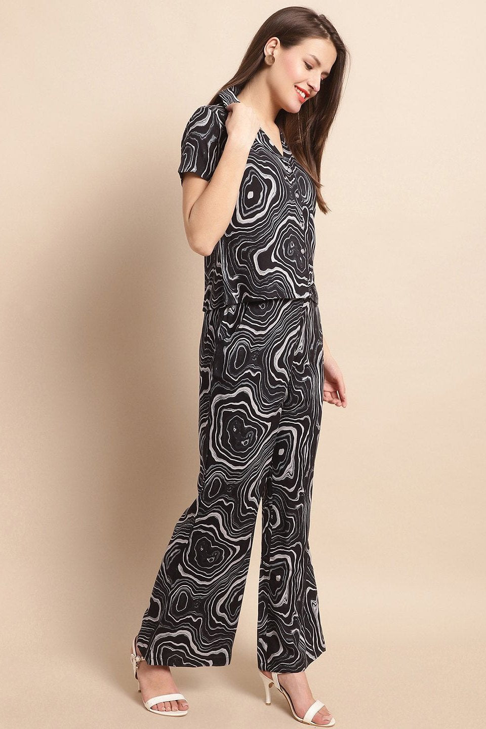 Lifestyle shot of the abstract print co-ord set worn outdoors
