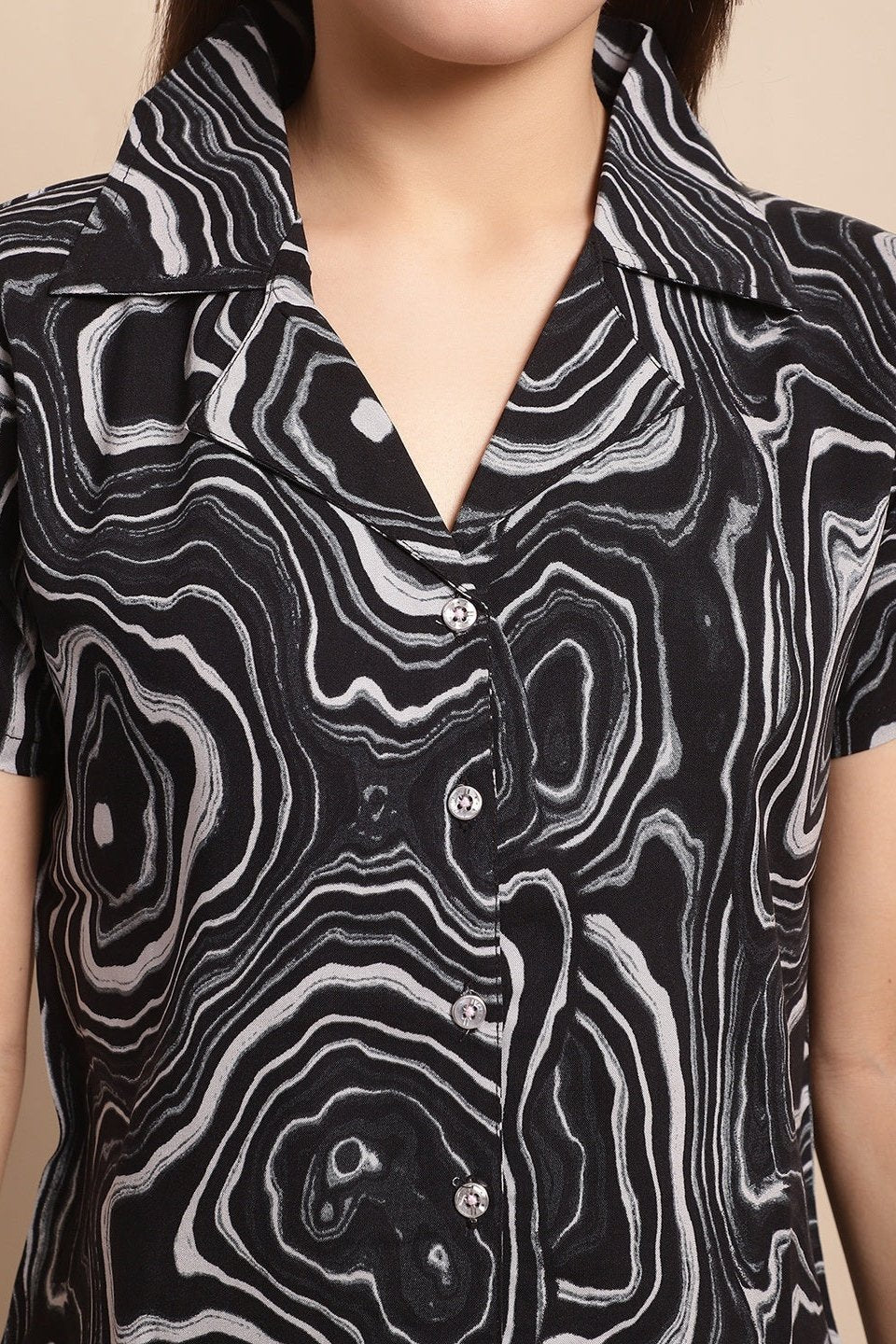 Close-up of the viscose rayon fabric on the black co-ord set
