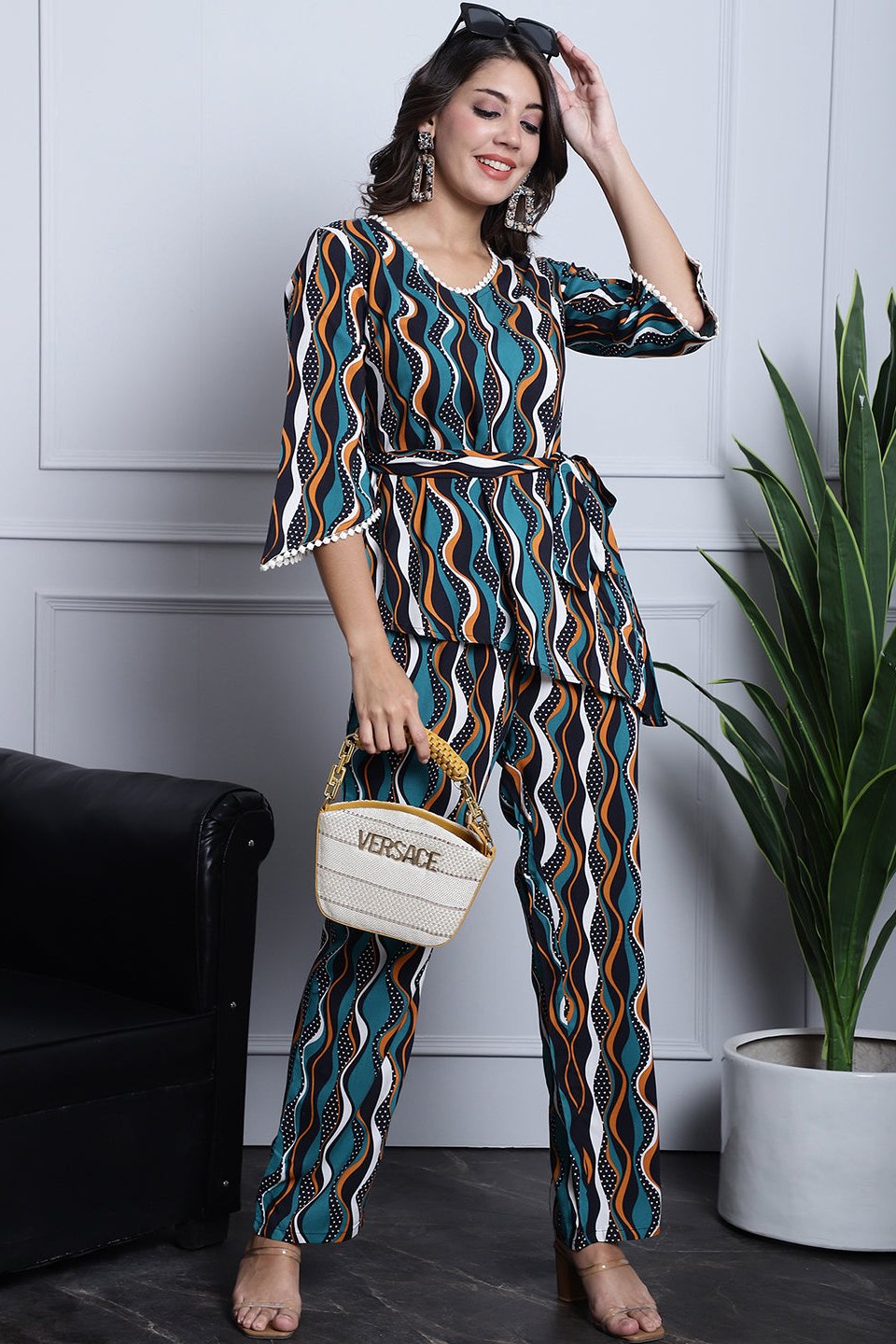 Woman wearing a green geometric co-ord set