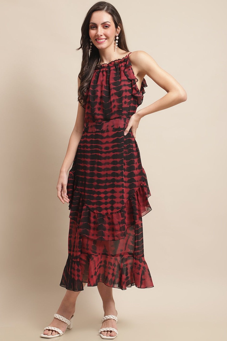 Woman wearing maroon georgette solid dress